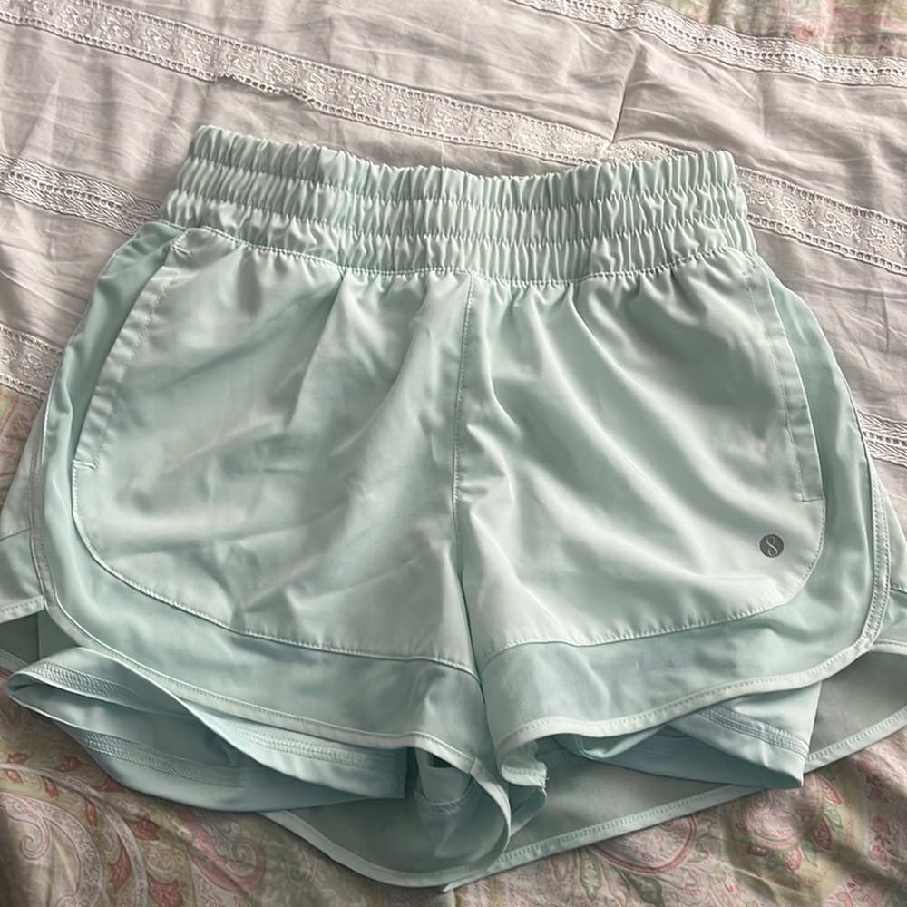 Mint green athletic shorts